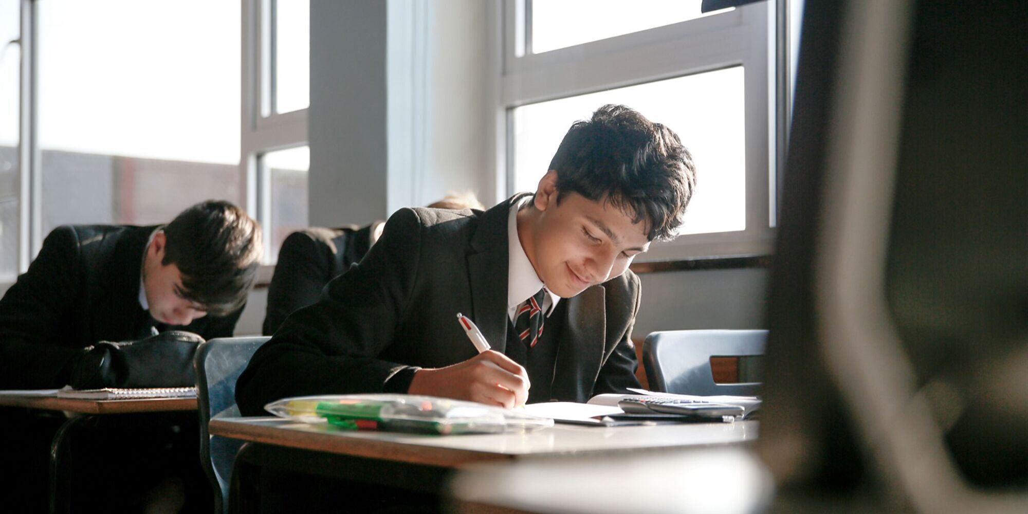 Young student working diligently